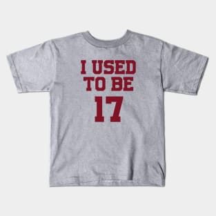 Seventeen, burgundy Kids T-Shirt